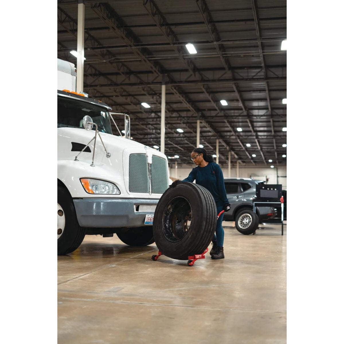 AFF 450-lb Truck Wheel Dolly with Pivoting Rollers & Bent Handle
