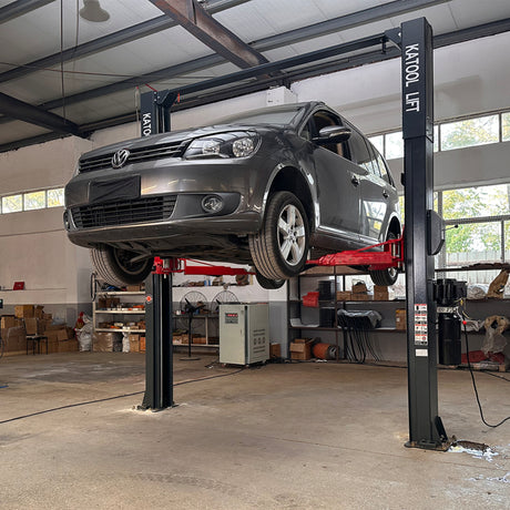 Katool KT-AS110D 11000 lbs Single Point Lock Release Two Post Asymmetrical Arm Car Lift